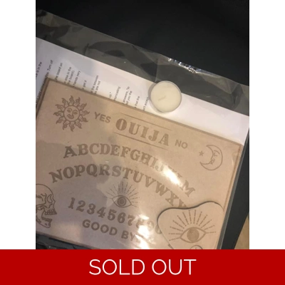 Ouija board with instructions and planchette plus candle £4 each